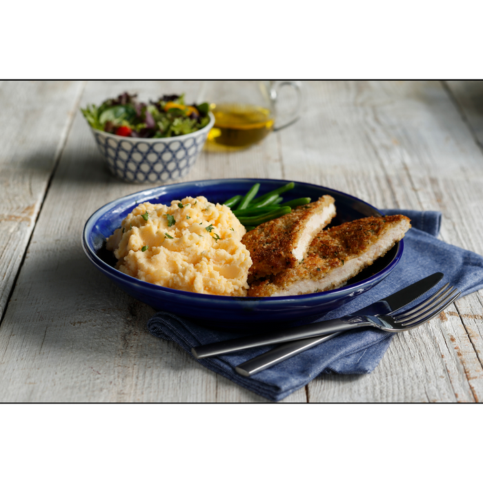 Image of cooked and plated Idahoan® Cheddar & Sour Cream Mashed Potatoes