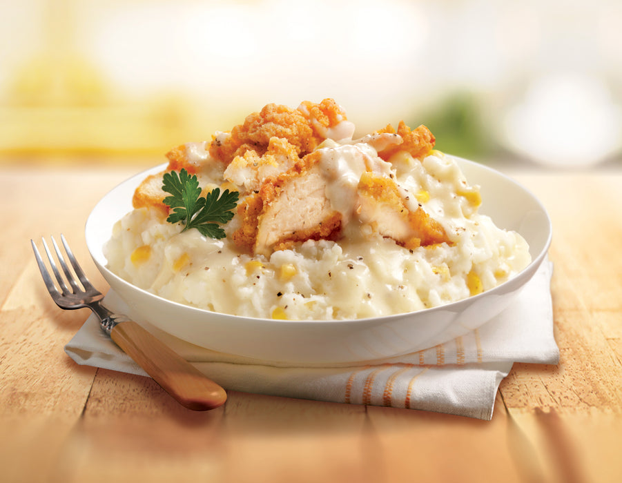 Idahoan® RUSTIC Buttery Golden Selects® Mashed Potatoes made on a plate