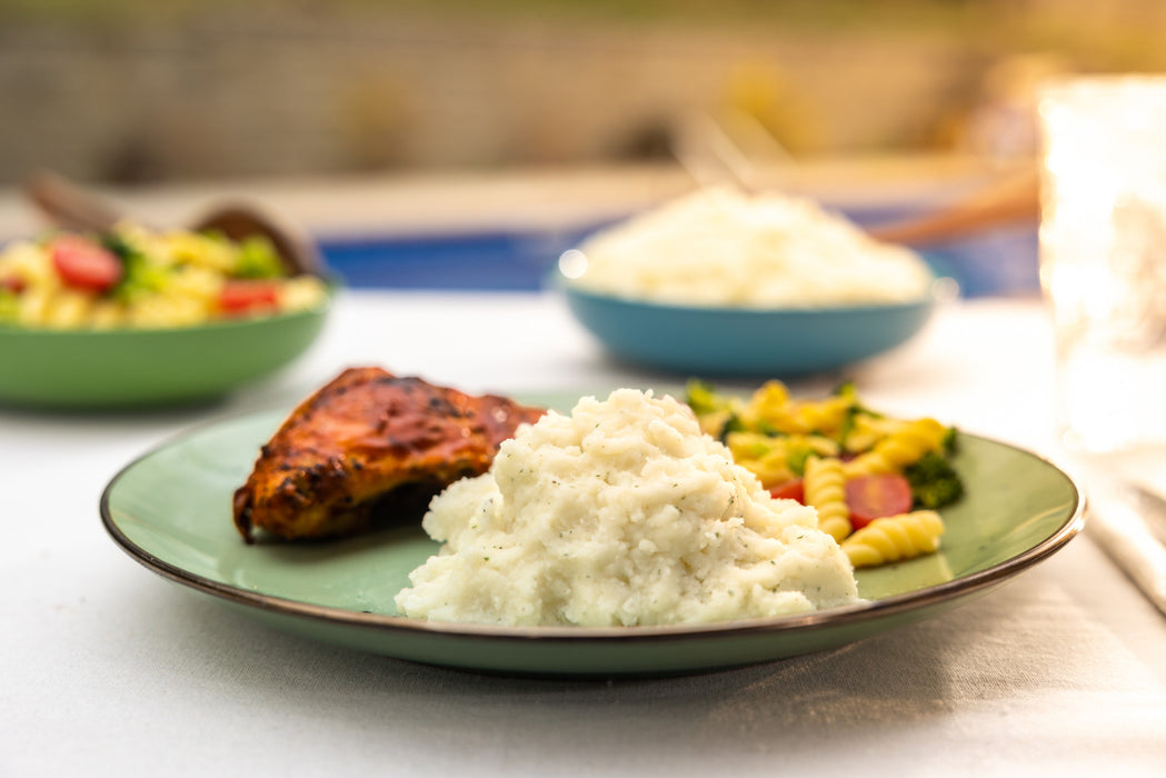 Image of cooked and plated Idahoan® Mashed Potatoes seasoned with Hidden Valley® Original Ranch®