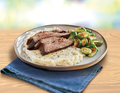 Idahoan® CREAMY Butter & Herb Mashed Potatoes made on a plate